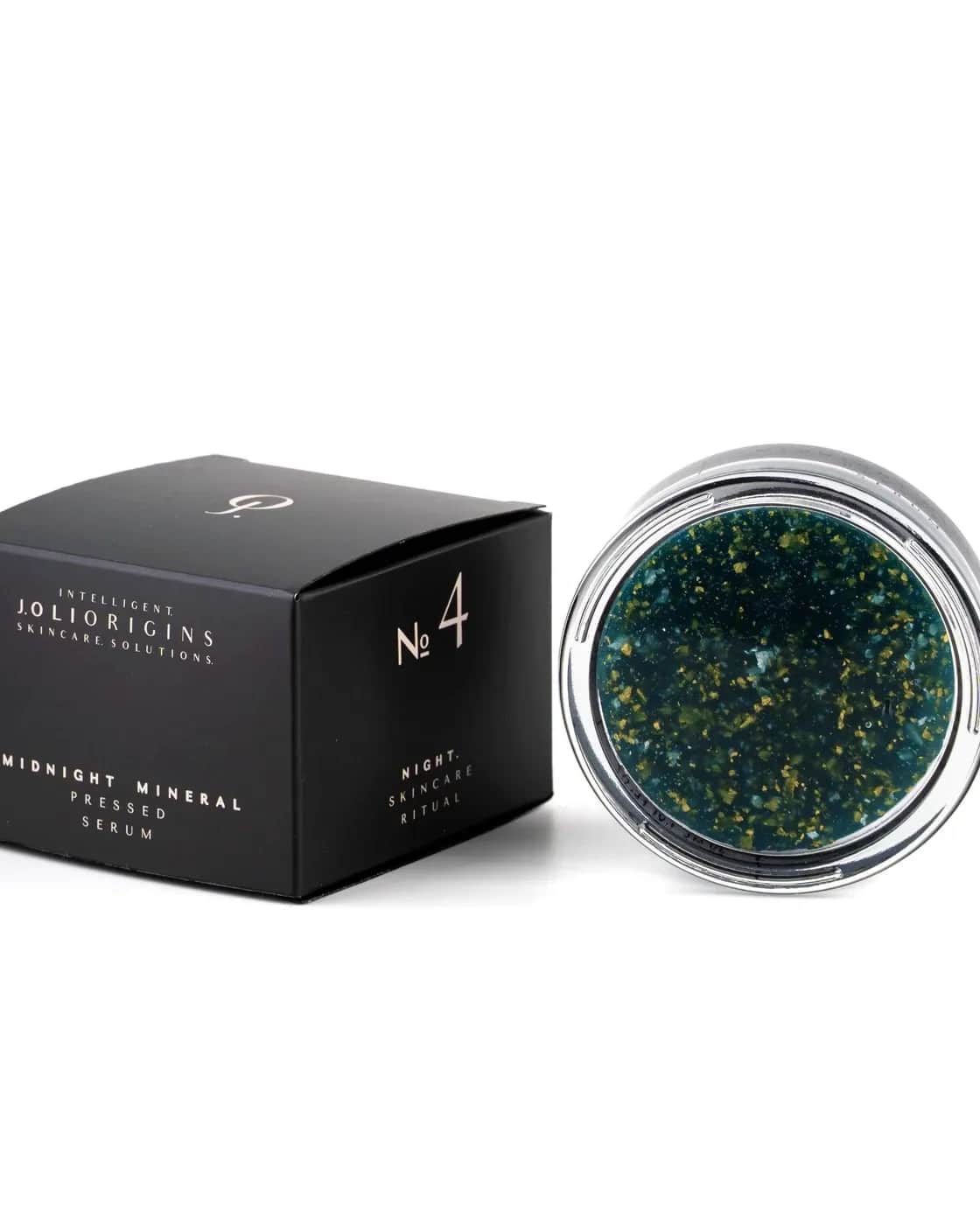 The night serum jar open, gold flakes visible.